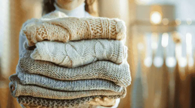 Woollen coats and sweaters ready for dry cleaning